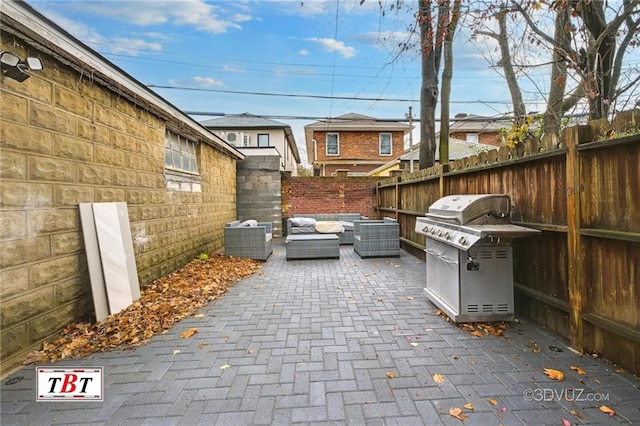 view of patio / terrace with a grill and an outdoor hangout area