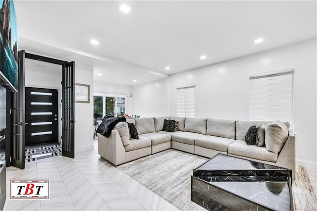 living room featuring recessed lighting