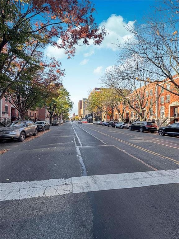 view of road with curbs