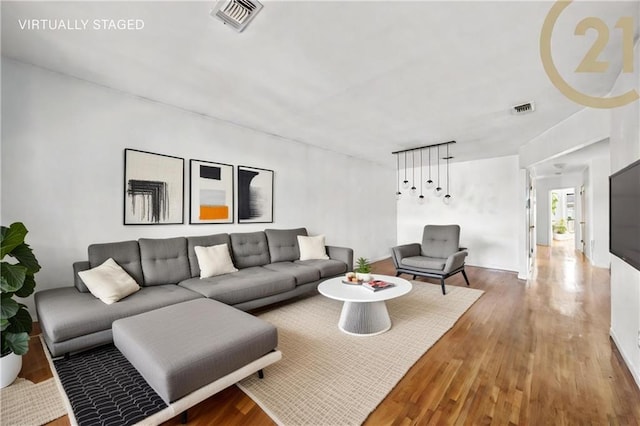 living room with hardwood / wood-style flooring