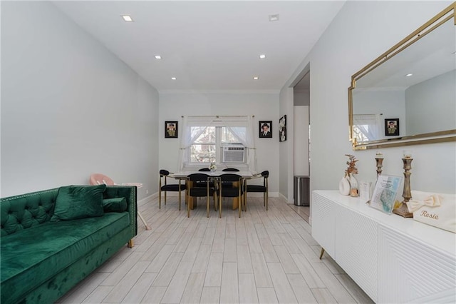 dining room featuring cooling unit, light wood-style flooring, baseboards, and recessed lighting