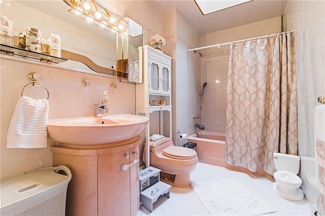 full bathroom featuring sink, tasteful backsplash, toilet, shower / tub combo with curtain, and tile walls