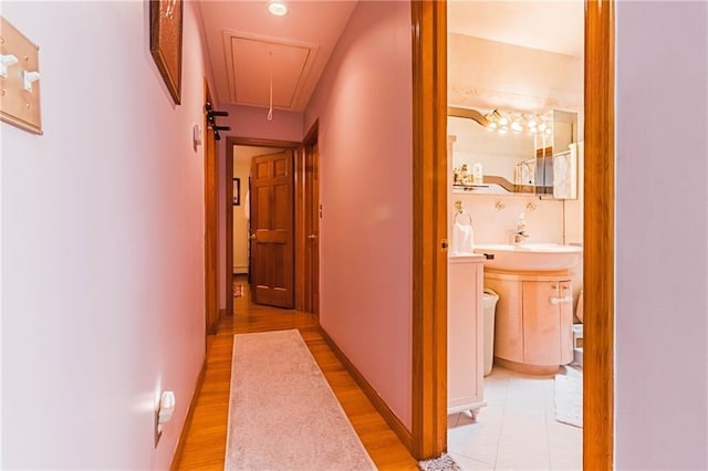 2572 W 16th St, Brooklyn, NY 11214 - hall with attic access and light wood-type flooring
