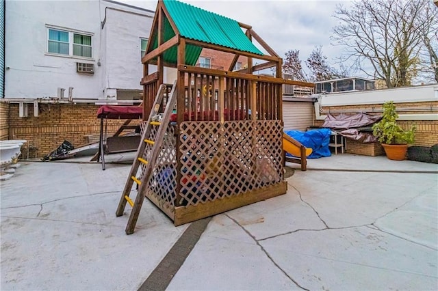 view of play area featuring a patio area