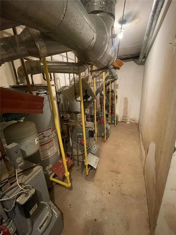 utility room with gas water heater
