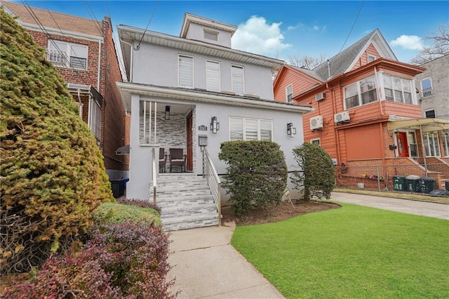 view of front facade with a front yard