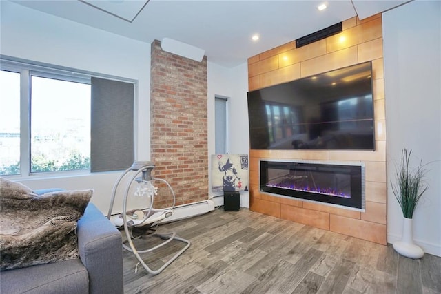 80 Bay St Unit 4A, Staten Island, NY 10301 - living room with wood finished floors, a glass covered fireplace, and recessed lighting