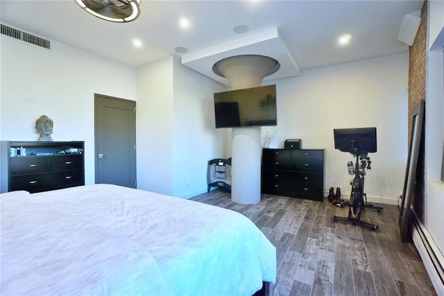 80 Bay St Unit 4A, Staten Island, NY 10301 - bedroom featuring baseboard heating, wood finished floors, baseboards, and recessed lighting