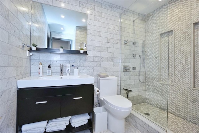 80 Bay St Unit 4A, Staten Island, NY 10301 - bathroom featuring tile walls, tiled shower, toilet, and vanity