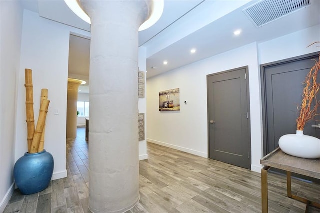 80 Bay St Unit 4A, Staten Island, NY 10301 - foyer entrance with wood finished floors, baseboards, decorative columns, and recessed lighting