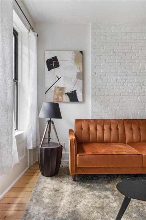 living area with hardwood / wood-style floors