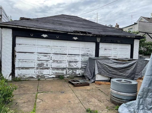 exterior space with a garage