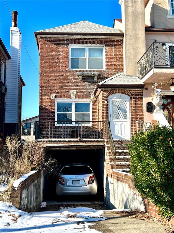 view of front of home with a garage