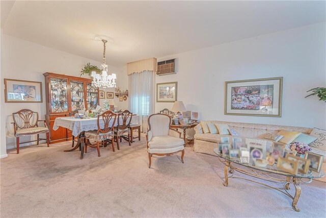 carpeted dining room featuring a wall mounted AC and a notable chandelier