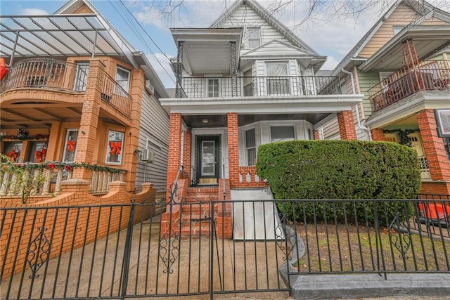 view of front of home with a balcony