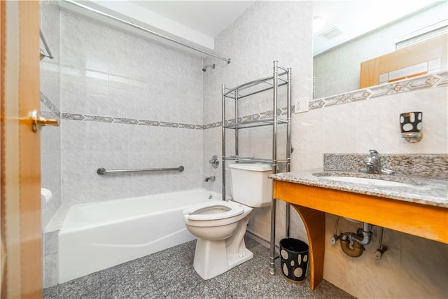 bathroom with visible vents, toilet, decorative backsplash, bathtub / shower combination, and tile walls