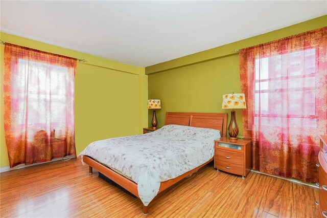 bedroom featuring light wood-type flooring