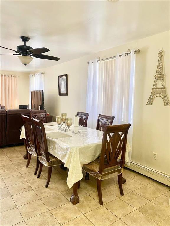153 Hendrix St, Brooklyn, NY 11207 - dining space featuring a ceiling fan and light tile patterned flooring