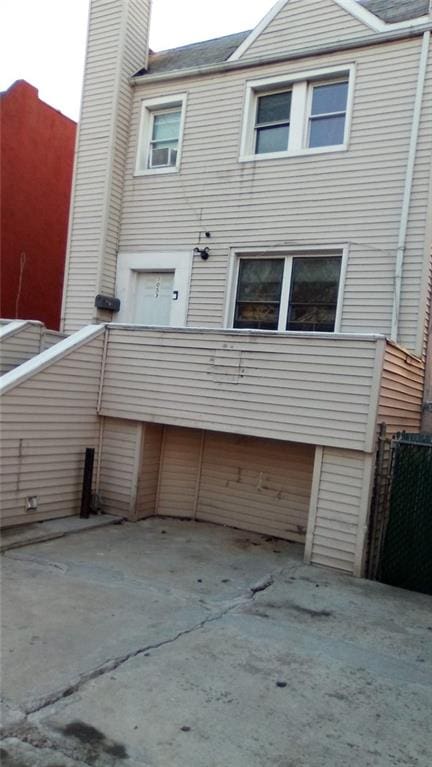 rear view of house with a chimney