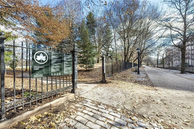 view of gate with fence