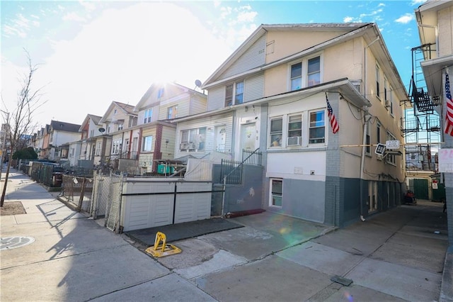 3024 Brighton 6th St, Brooklyn, NY 11235 - view of front of home featuring a residential view and stucco siding
