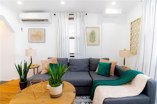 living room featuring a wall mounted air conditioner