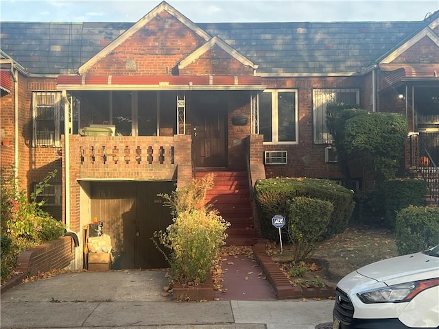 view of front of property with a balcony