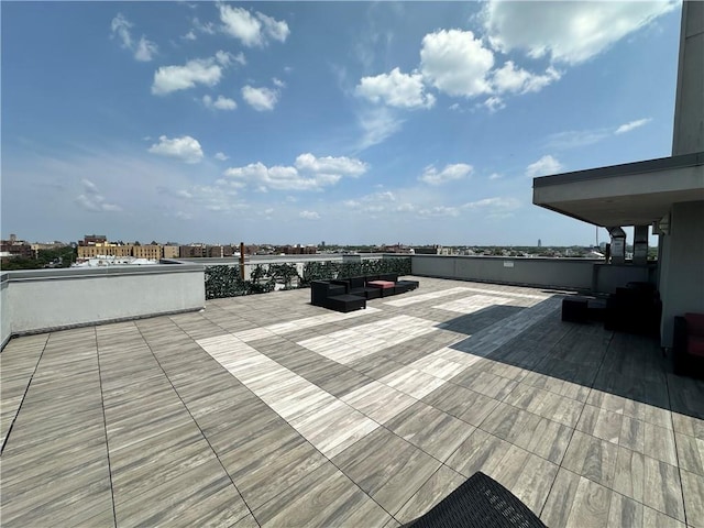 wooden deck with a view of city