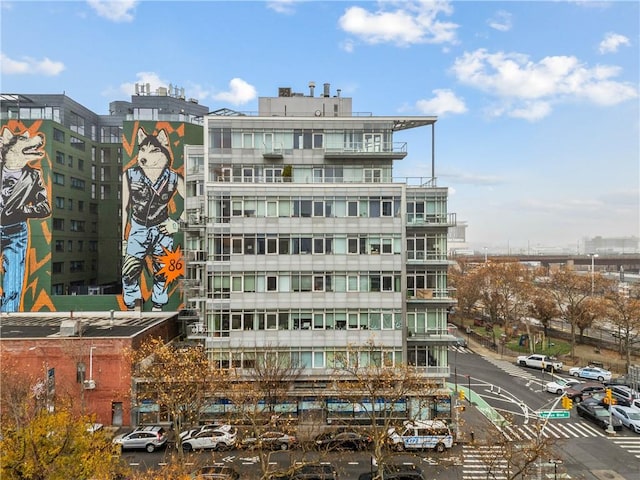 view of building exterior featuring a view of city