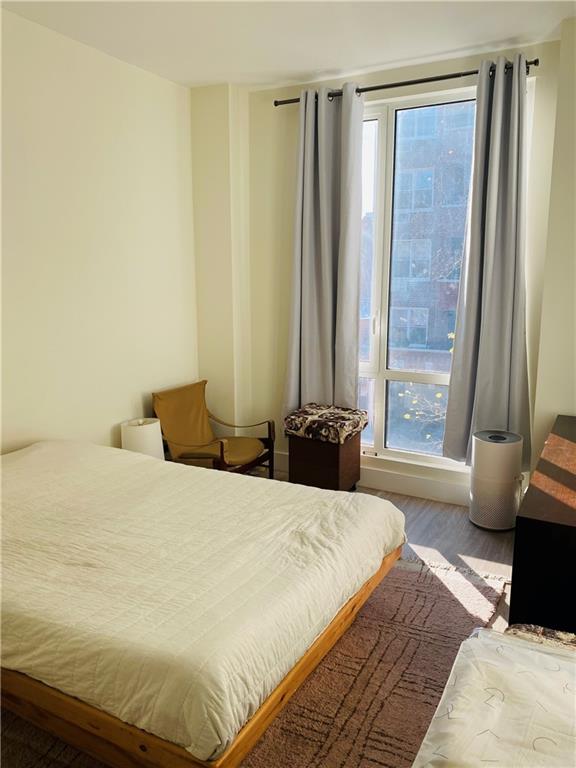 bedroom featuring hardwood / wood-style floors