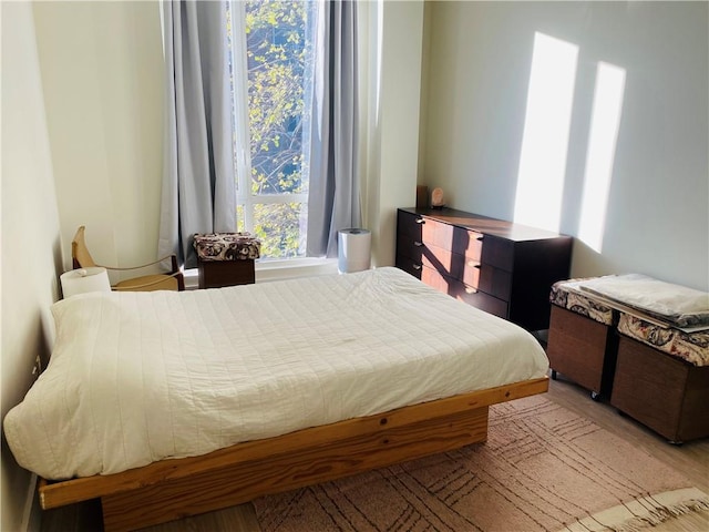 bedroom featuring light hardwood / wood-style floors