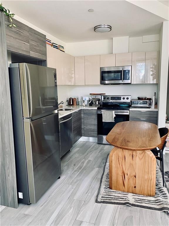 kitchen featuring sink and appliances with stainless steel finishes