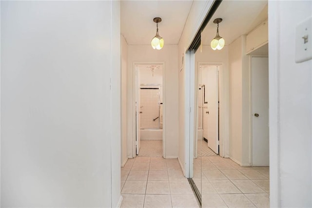 hallway with light tile patterned floors