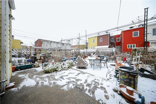 view of snow covered patio