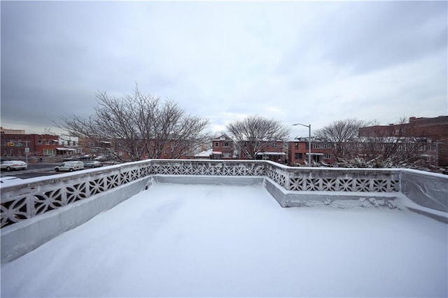 view of snow covered pool