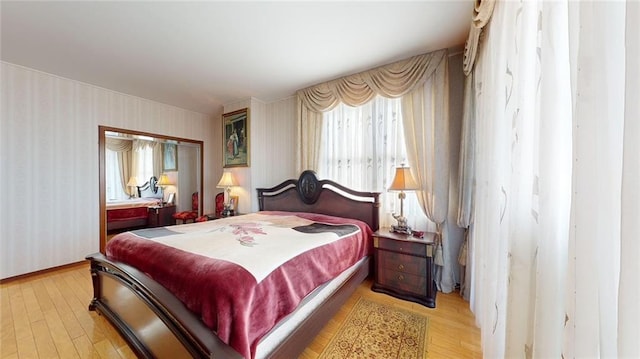 bedroom featuring light wood-type flooring