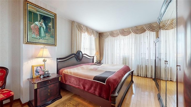 bedroom featuring light wood-type flooring