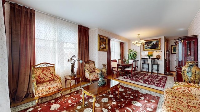 living area featuring an inviting chandelier