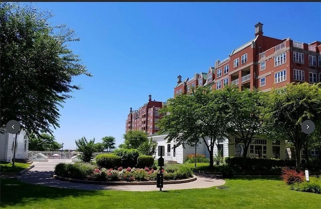 view of community with a yard