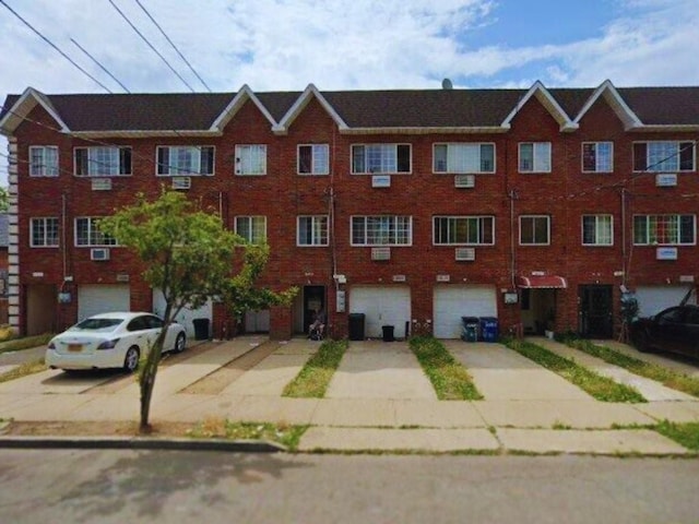 view of building exterior with central AC