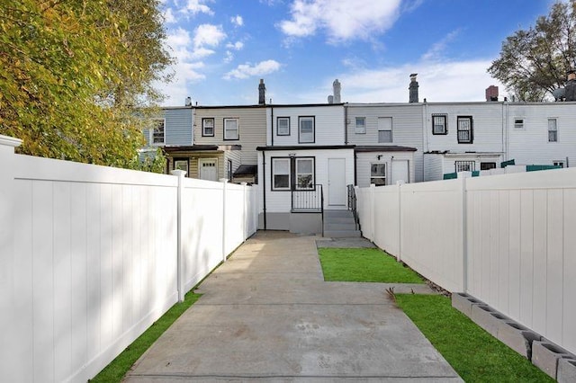 back of property with a patio area