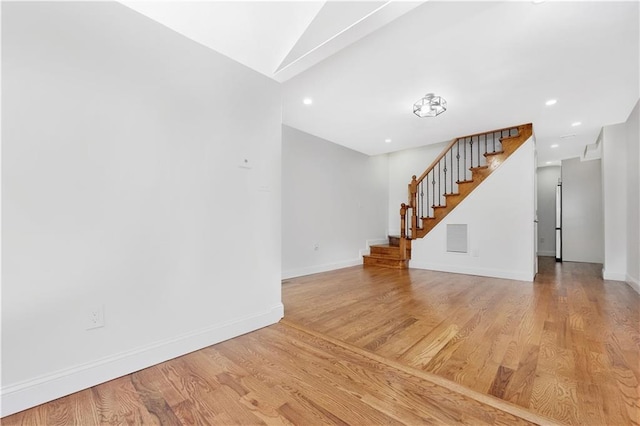 unfurnished living room featuring light wood-type flooring