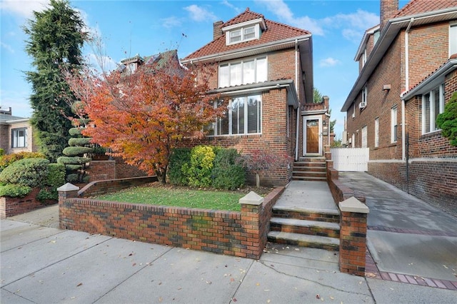 view of front of property featuring brick siding