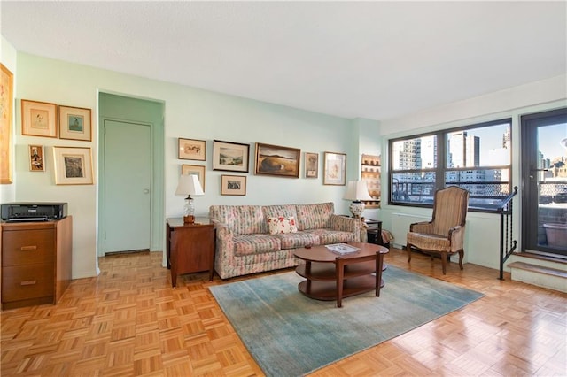 living room featuring light parquet flooring