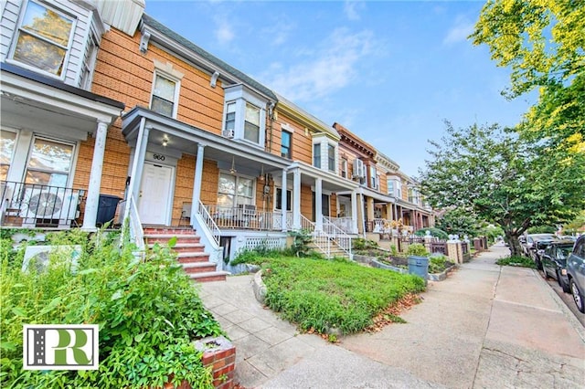 view of front of home featuring a porch and a residential view