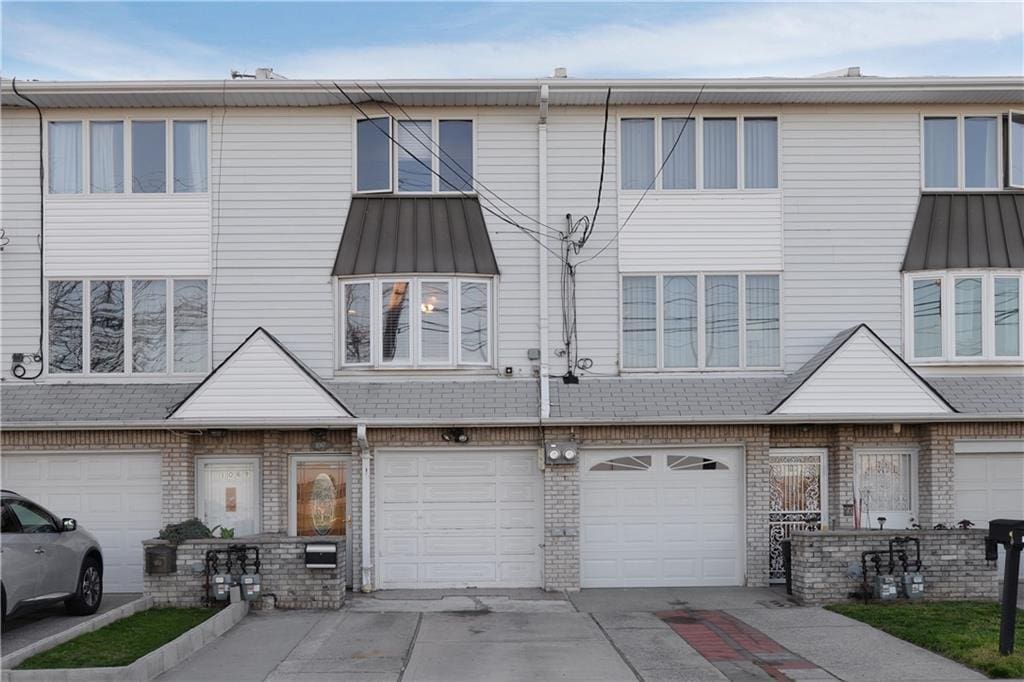 view of property featuring a garage