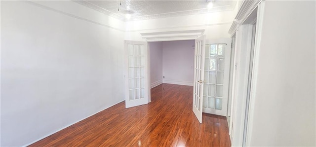 empty room with french doors and dark wood-type flooring