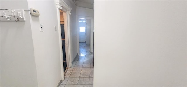 hallway featuring light tile patterned flooring