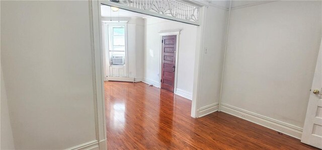 interior space featuring cooling unit and hardwood / wood-style floors