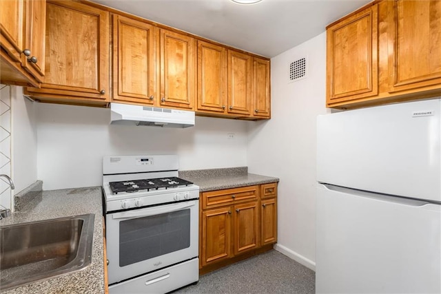 2035 E 7th St Unit 5F, Brooklyn, NY 11223 - kitchen featuring white appliances, under cabinet range hood, and brown cabinets